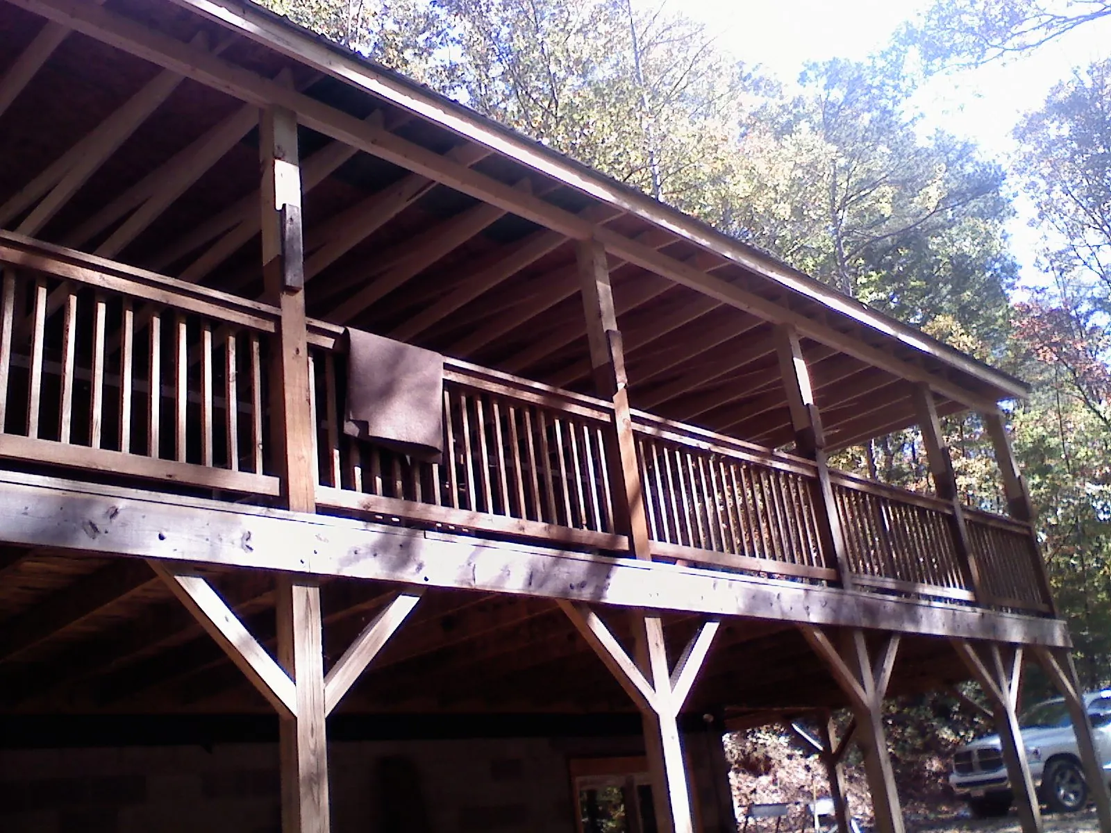 Timber framing under a new elevated porch and deck — Roof Leak Repair in Wind Ridge by Roofing Brothers